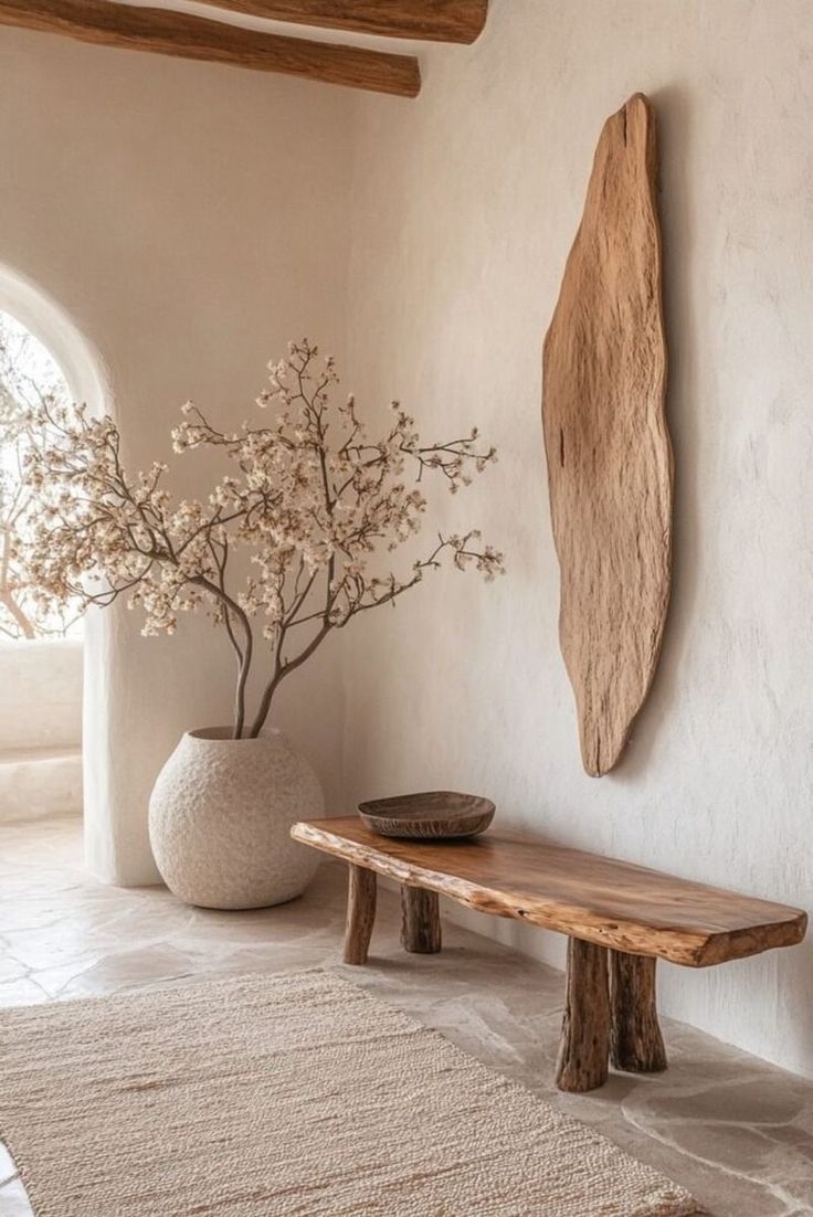 Minimalist Rustic Decor - Natural Wood Bench & Textured Ceramic Vase. Features organic elements, soft neutrals, and sculptural accents for a serene and earthy aesthetic.