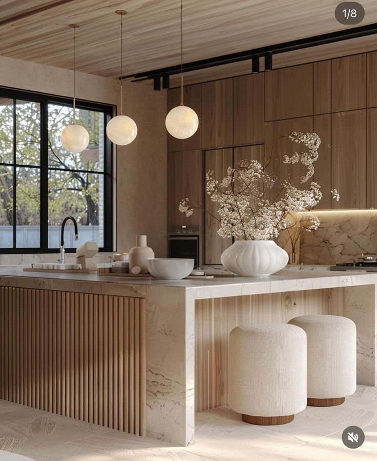 Japandi-Inspired Kitchen Design - Minimalist Aesthetic with Natural Wood, Marble Accents & Soft Lighting. Features sleek cabinetry, globe pendants, and neutral tones for a serene atmosphere.