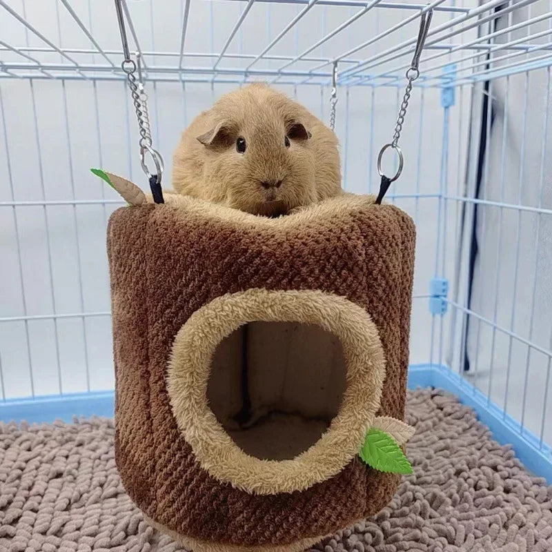 "Cozy Tree Stump Hamster Hammock – Warm Winter Hideaway for Small Pets!"