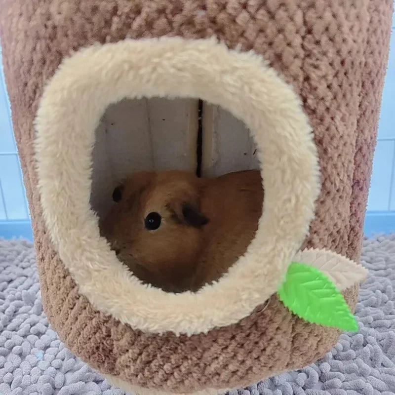 "Cozy Tree Stump Hamster Hammock – Warm Winter Hideaway for Small Pets!"